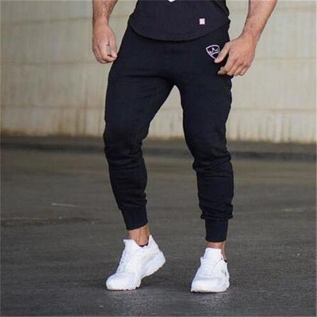 Homens joggers sweatpants homens joggers calças roupas esportivas calças de musculação de alta qualidade/colete de fundo absorvente de suor e respirável