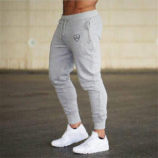 Homens joggers sweatpants homens joggers calças roupas esportivas calças de musculação de alta qualidade/colete de fundo absorvente de suor e respirável